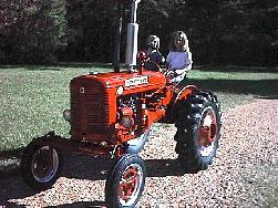 boy driving tractor