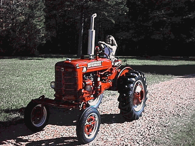 girl driving tractor